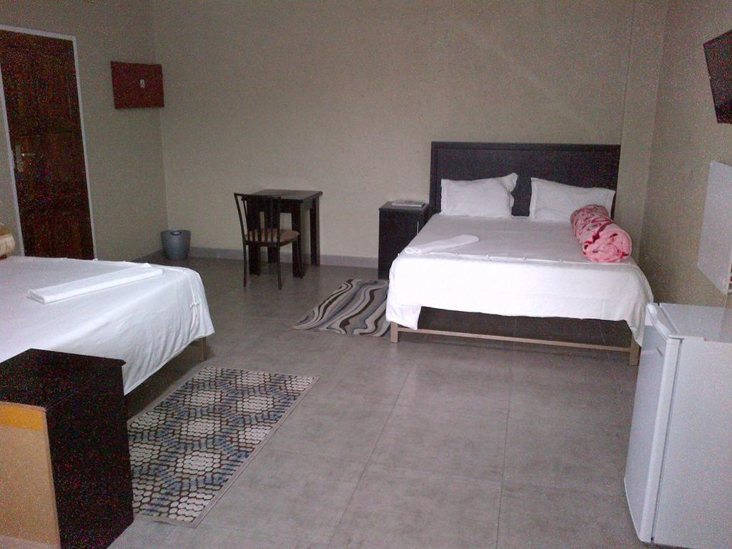 Chisam Guest Lodge Pty Ltd Joanesburgo Quarto foto