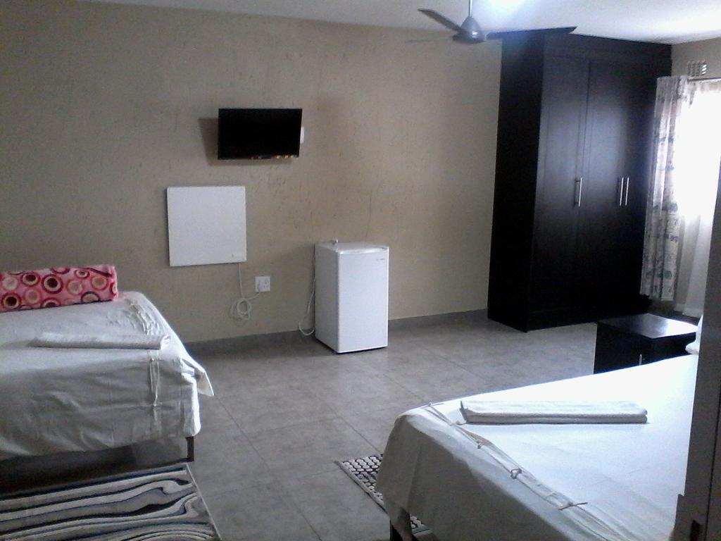 Chisam Guest Lodge Pty Ltd Joanesburgo Quarto foto