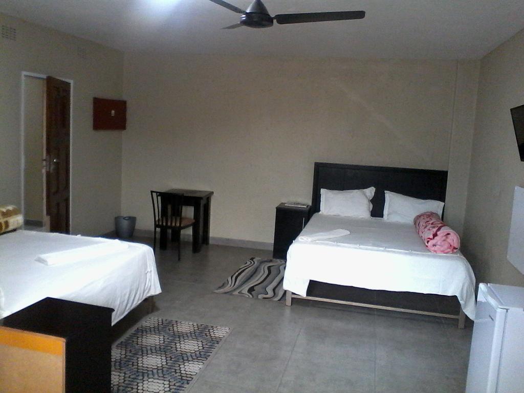Chisam Guest Lodge Pty Ltd Joanesburgo Quarto foto