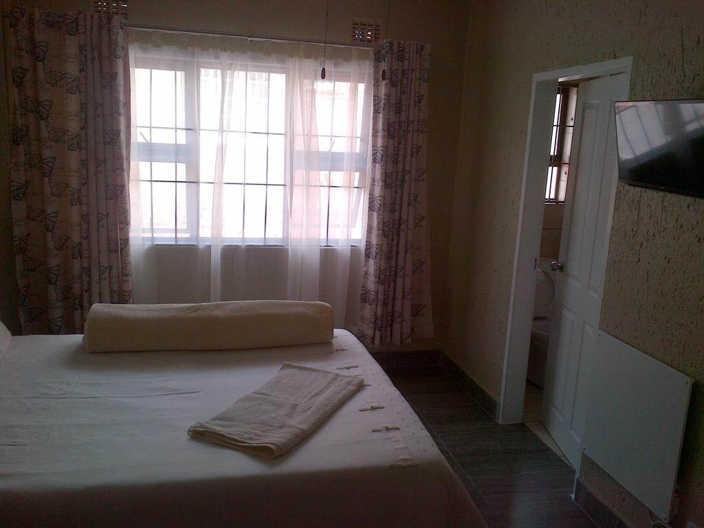 Chisam Guest Lodge Pty Ltd Joanesburgo Quarto foto